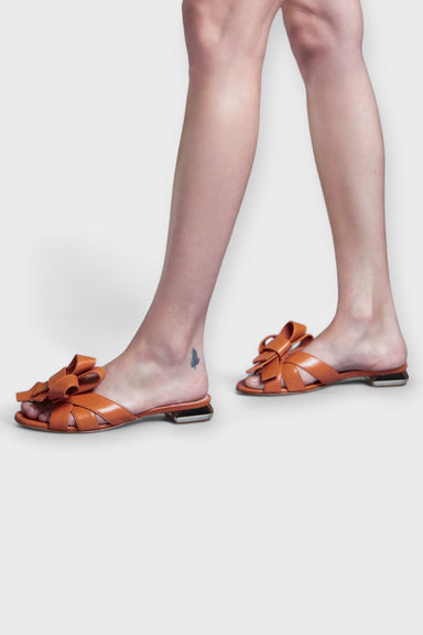 Zoe Orange Leather Bow Sandals on Model 2 by Danilo di Lea Italian Women's Shoes