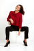 AnnaCristy Milano Red Cowl Neck Ruffled Blouse with Black Slacks Sitting- Made in Italy